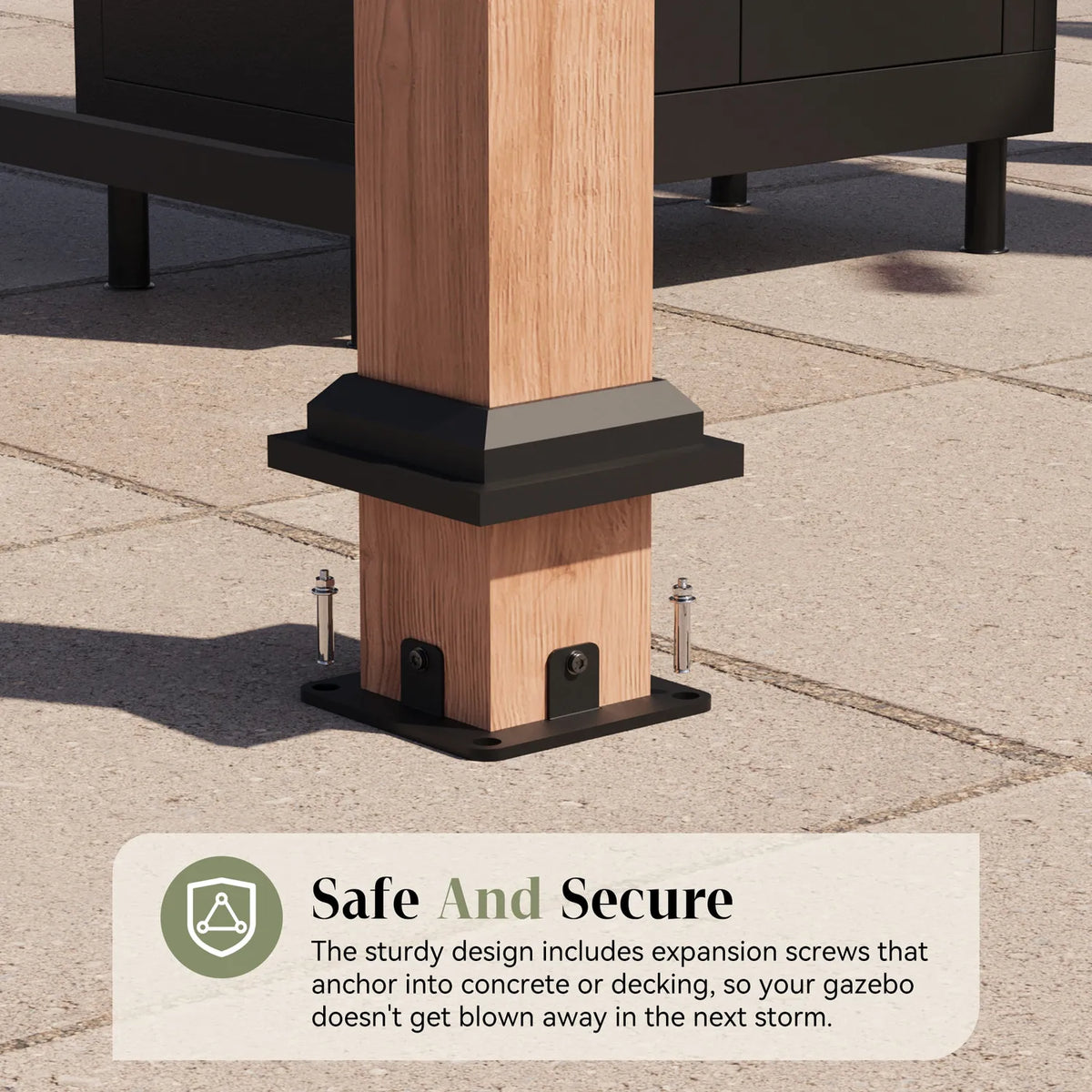 Black steel base plate with expansion anchors securing a wooden gazebo post to a concrete slab
