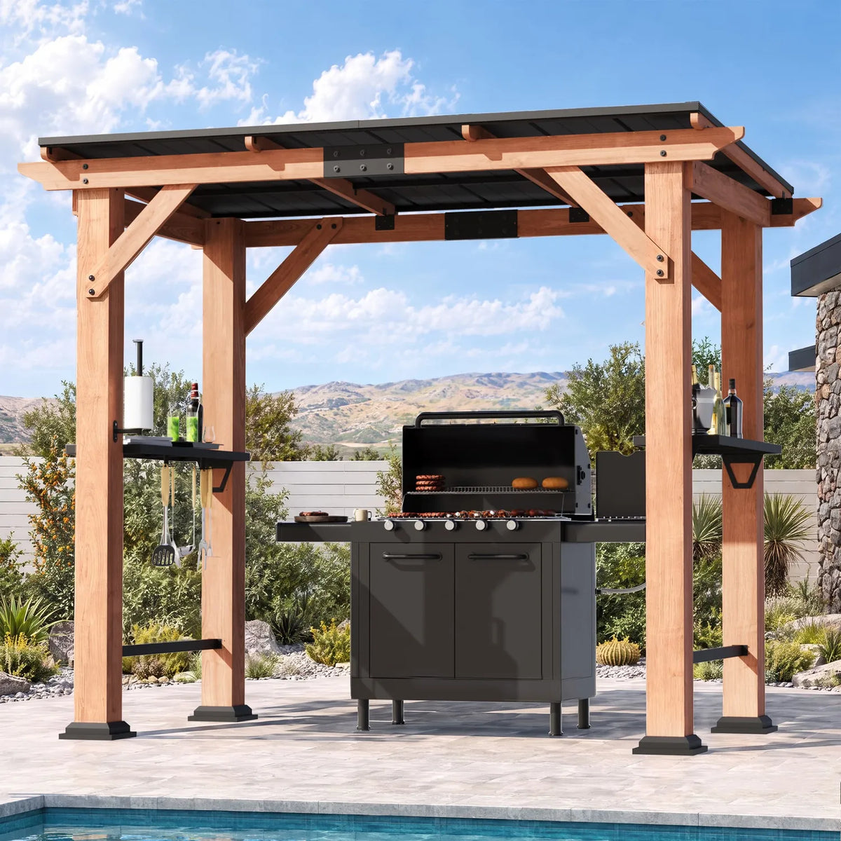 Wooden sloped-roof gazebo sheltering a grill in a green landscaped backyard
